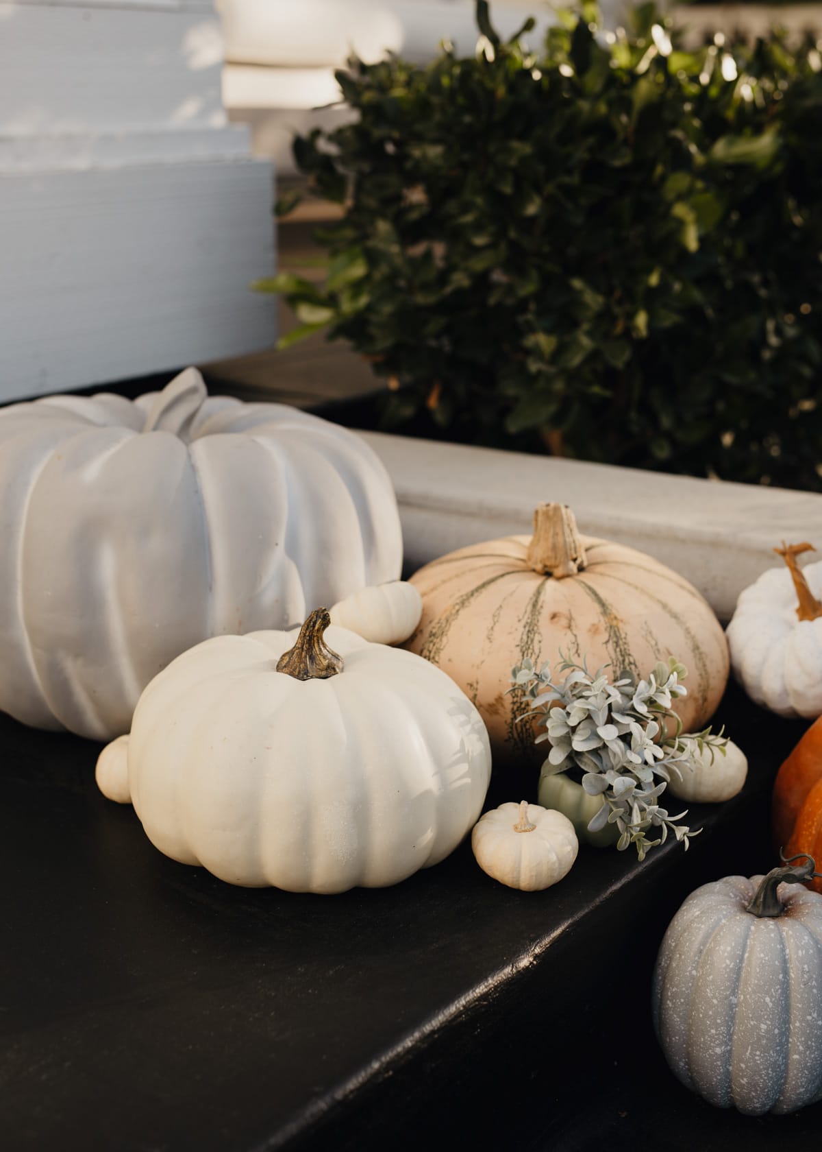 cascading pumpkins on front porch for fall