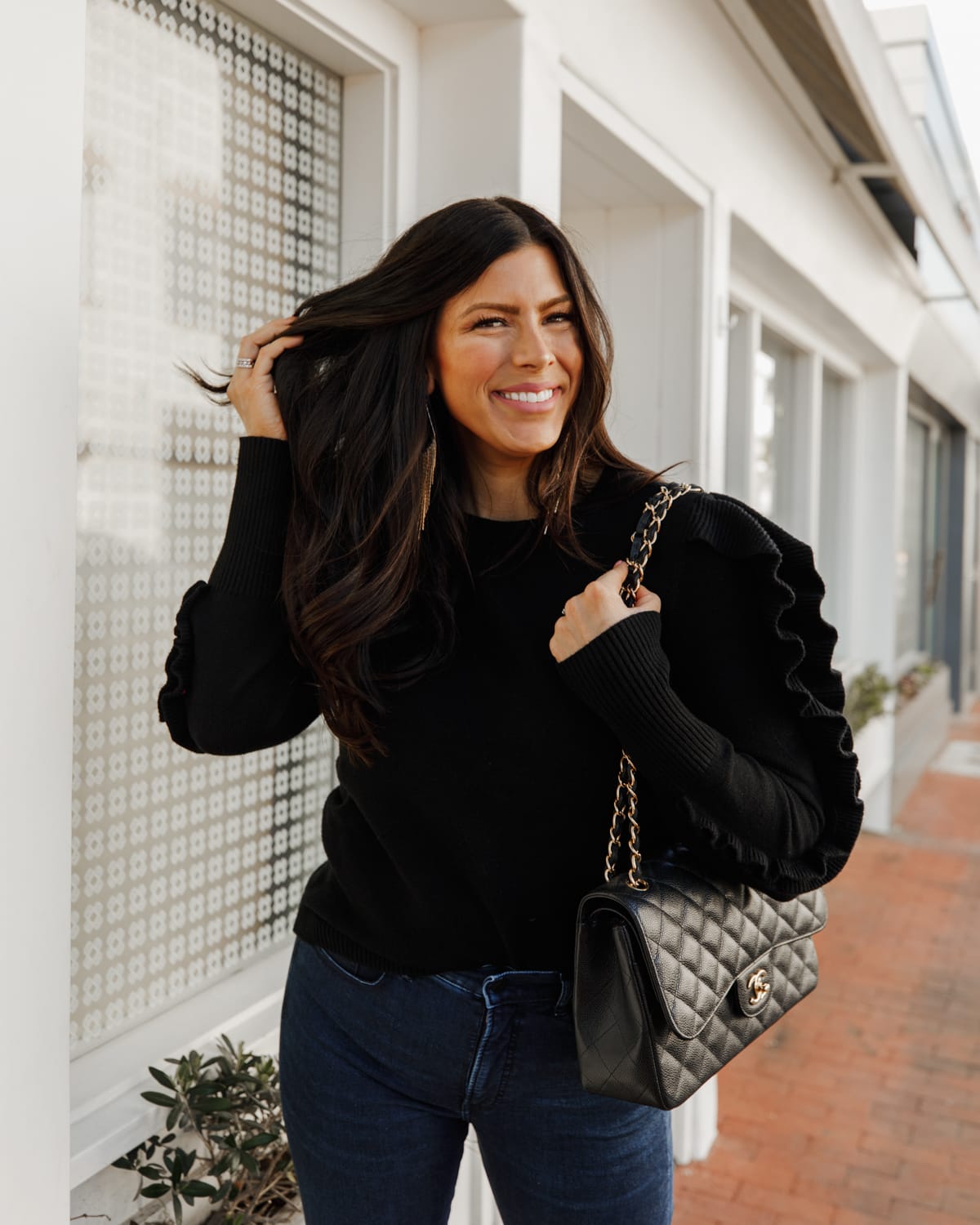 black ruffle sweater