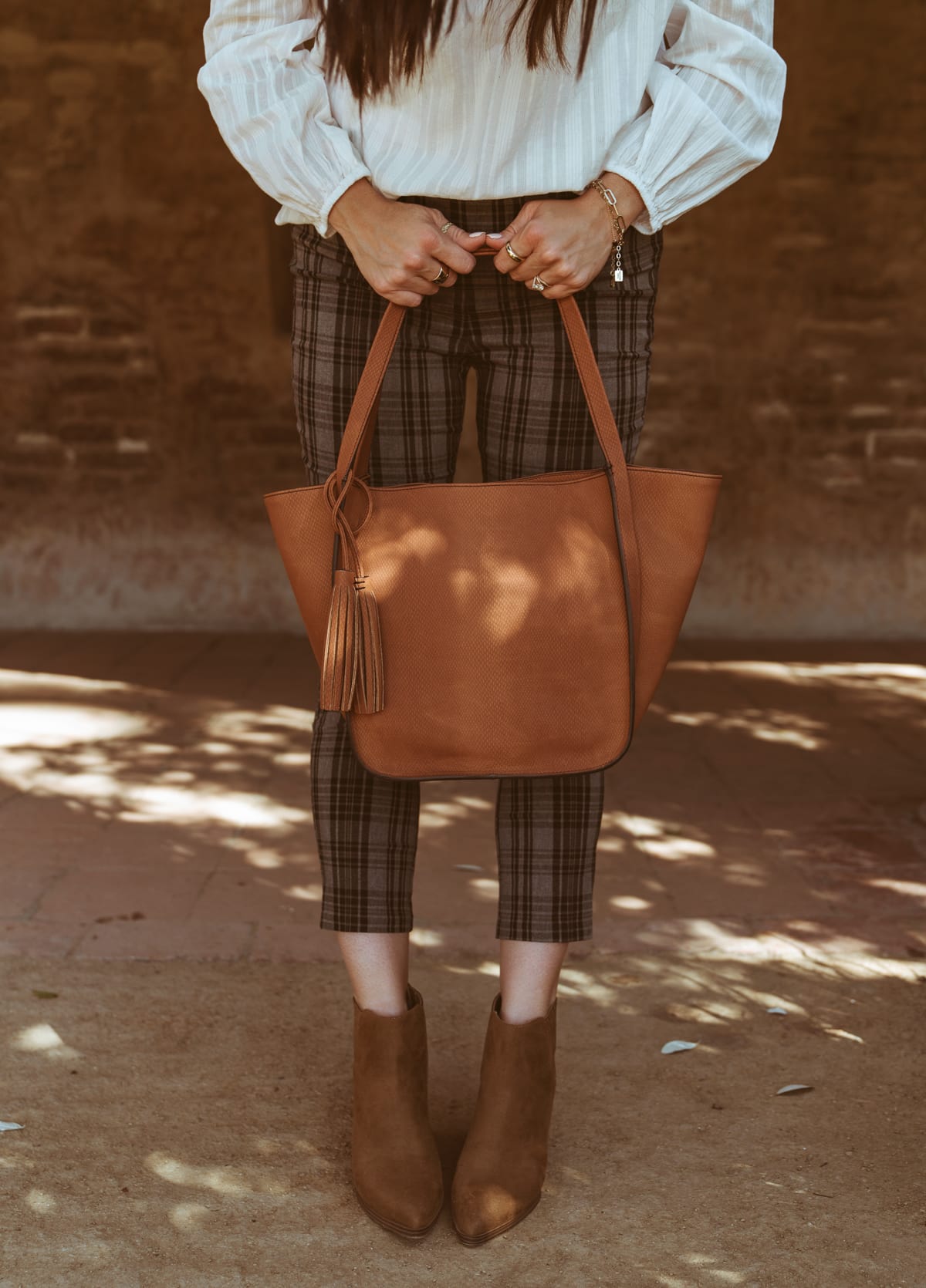 leather bag with tassel