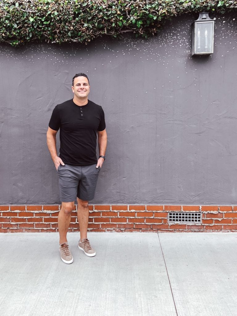 Neil wearing Vuori Meta Shorts