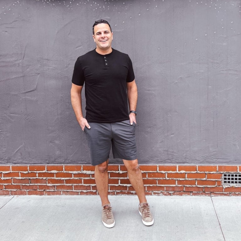 Neil wearing Vuori Meta shorts