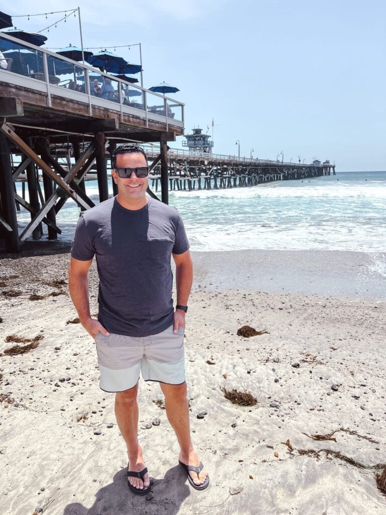Neil wearing boardshorts