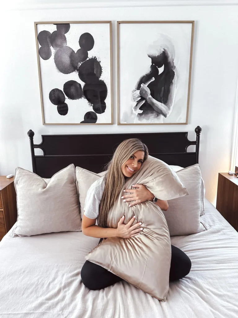 Corrine hugging her COOP pillow