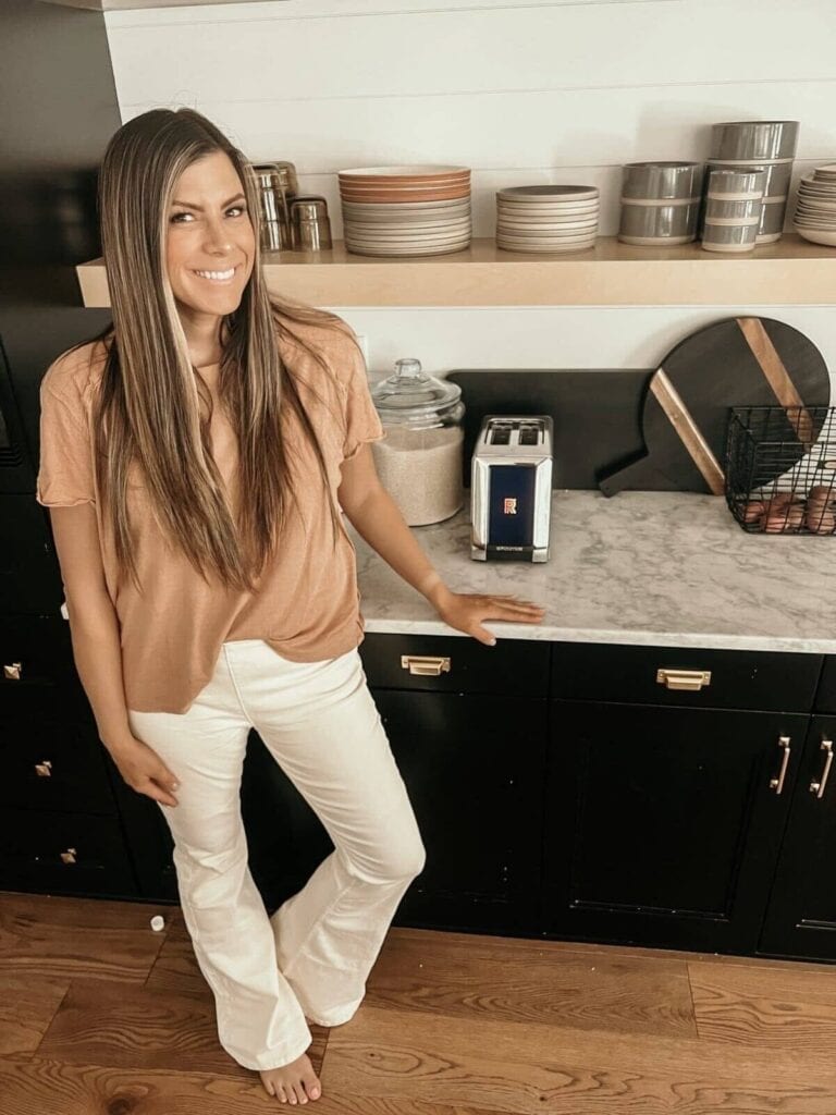Corrine wearing Jayde Flare Jeans