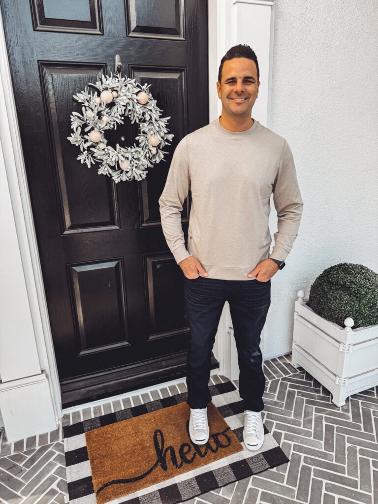 Neil wearing Paige jeans