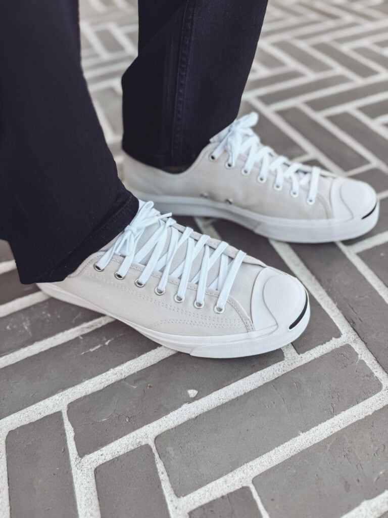 Neil wearing converse low top