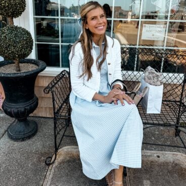 Corrine is wearing a blue and white Shirt Dress by Exquise