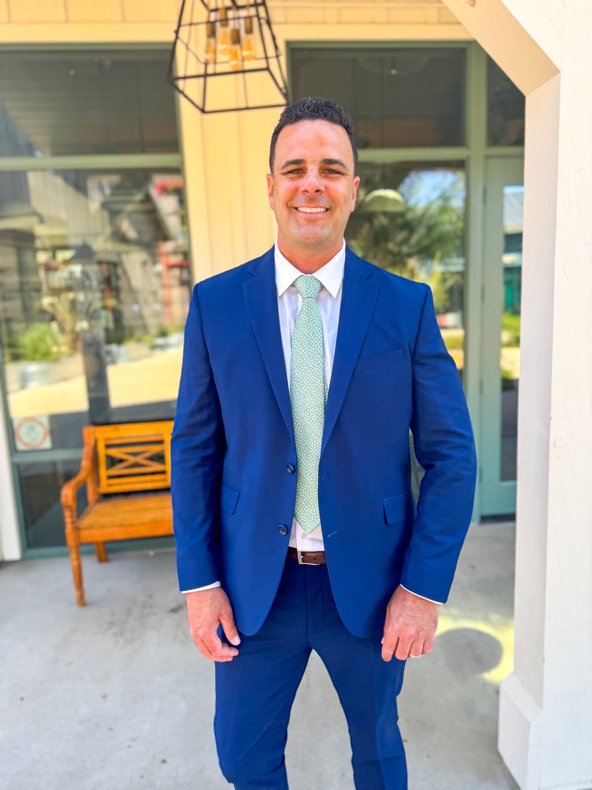 Neil wearing blue suit