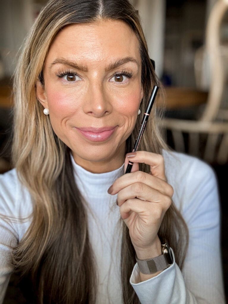 Corrine holding Anastasia Brow Wiz