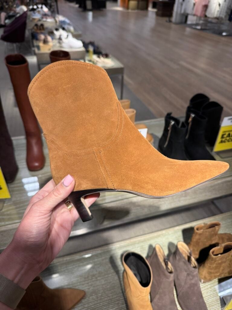 Corrine holding Atema Kitten Heel Bootie