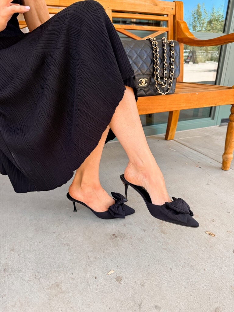 Corrine wearing goldie bow pointed toe mule