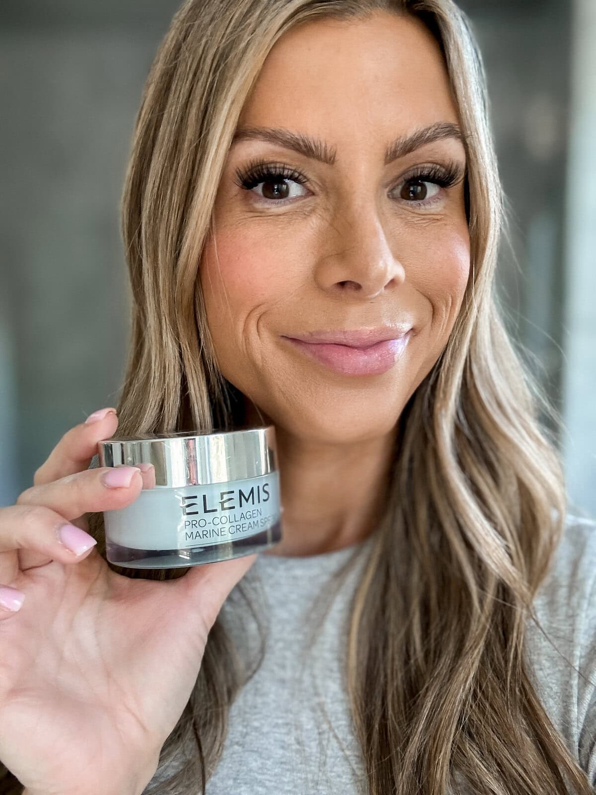 corrine holding elemis pro-collage marine cream