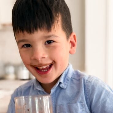 Harry enjoying his chocolate milk