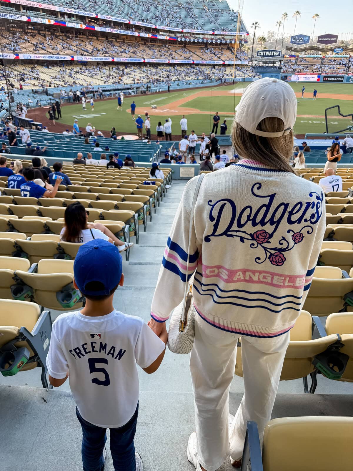 Back view of Dodgers bomber jacket with Harry at stadium