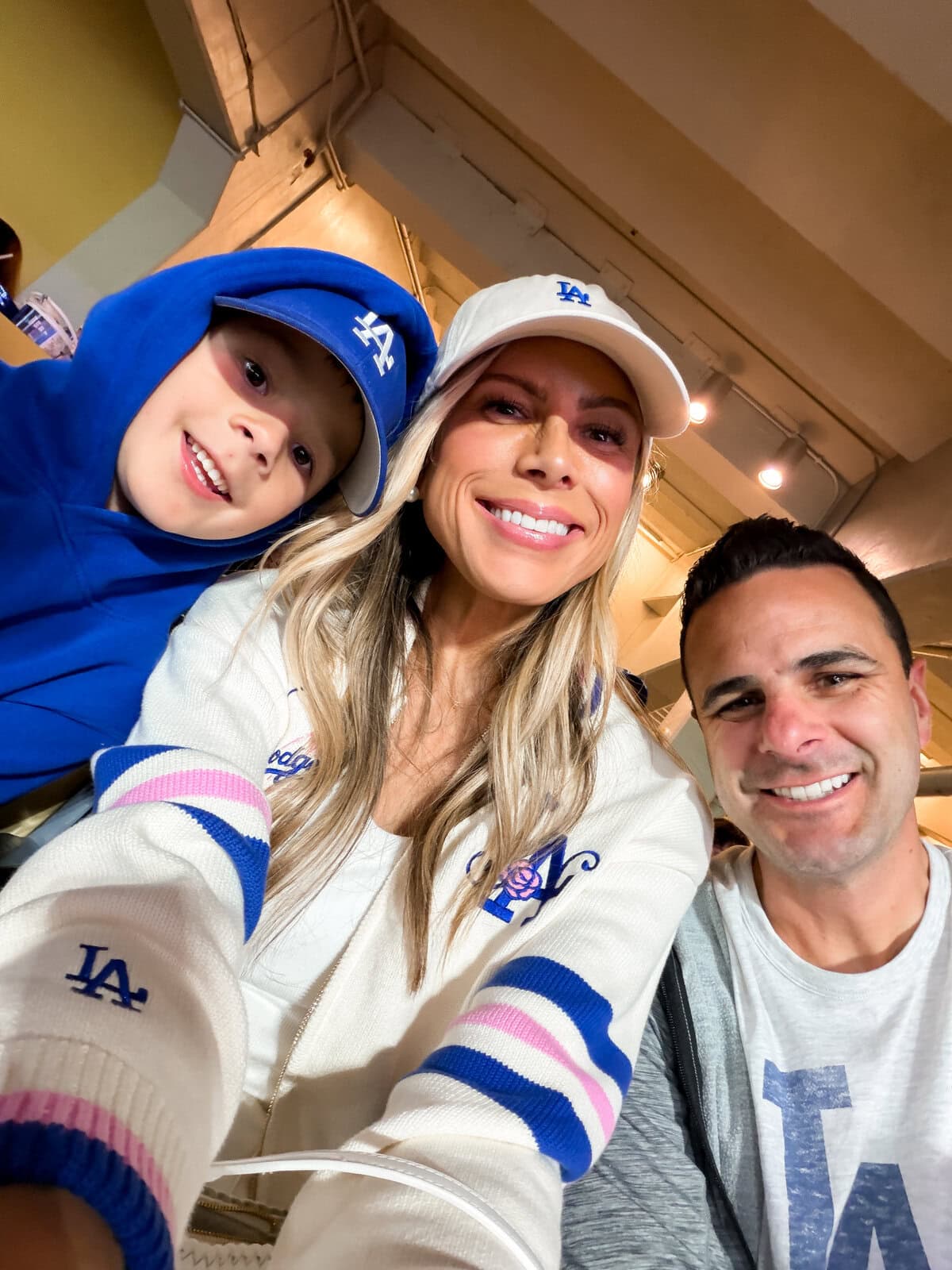 Dodgers bomber close-up with mini LA hat and Harry
