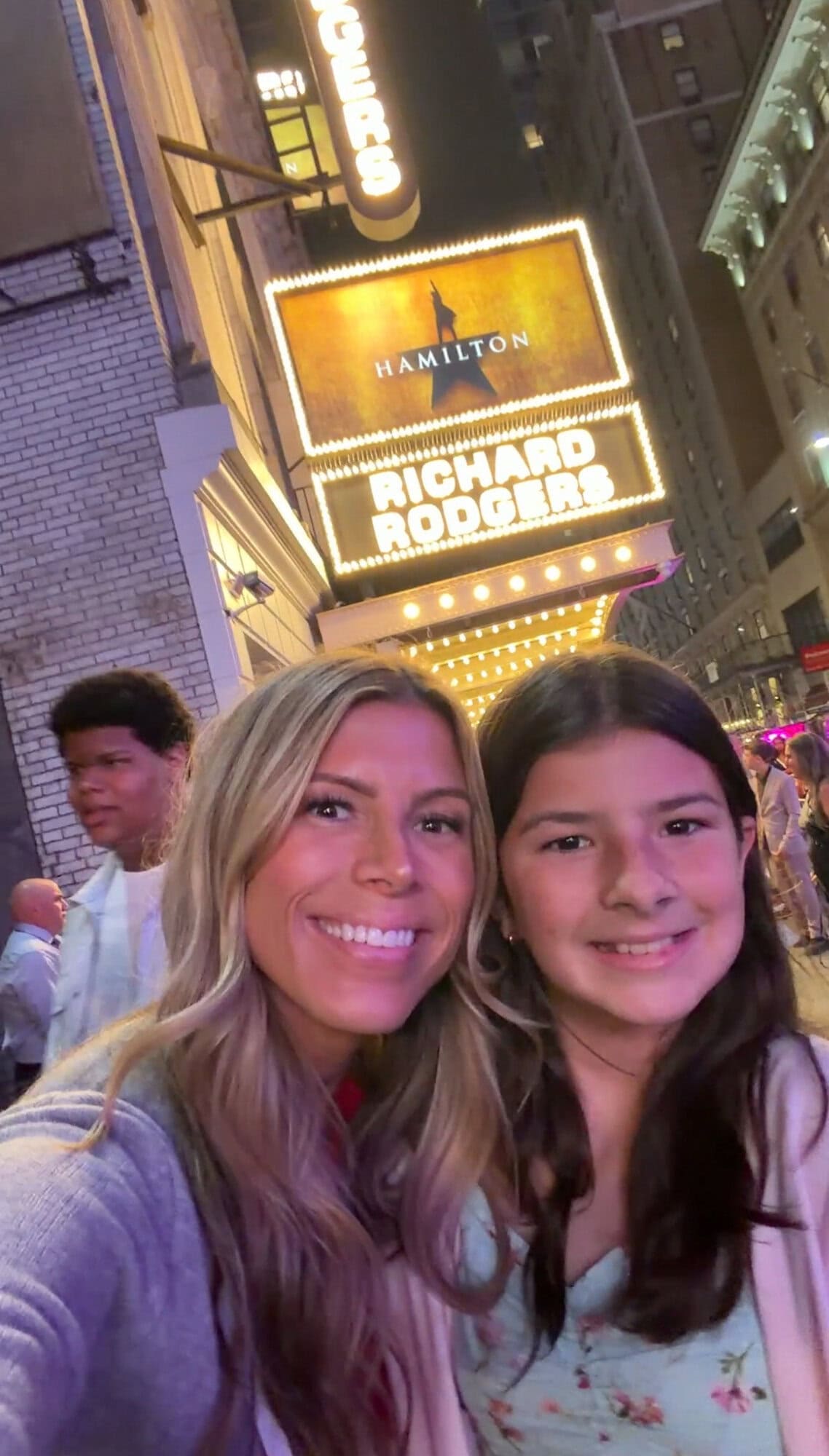 Mom and tween daughter selfie outside the Richard Rodgers Theater on Broadway after seeing Hamilton in NYC