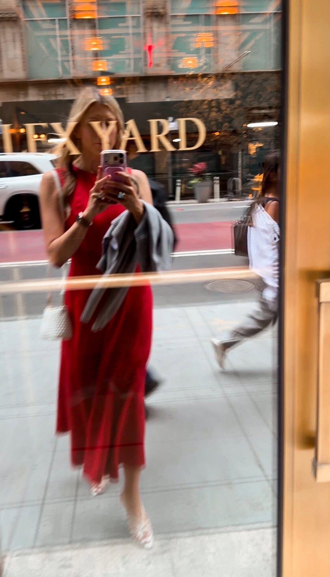Mirror selfie red dress white bag cardigan heels