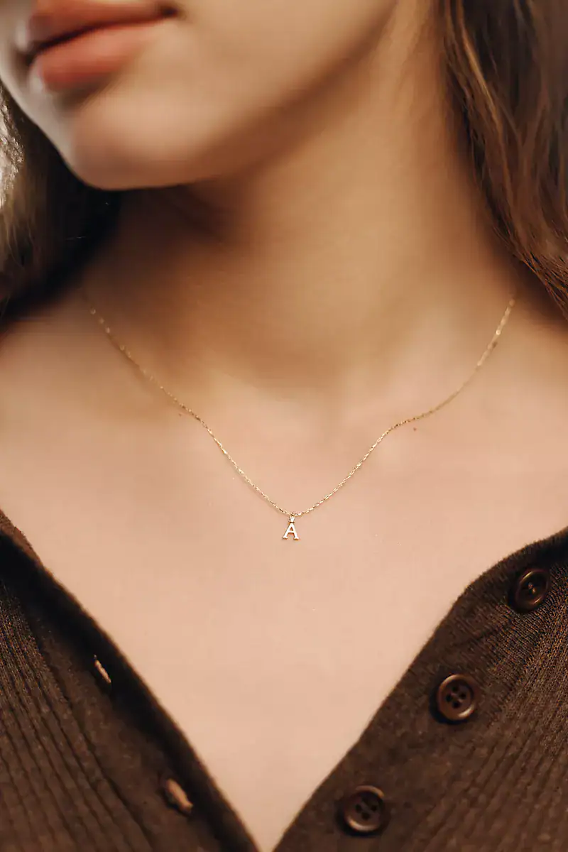 Anthropologie Crystal Initial Pendant Necklace stock photo