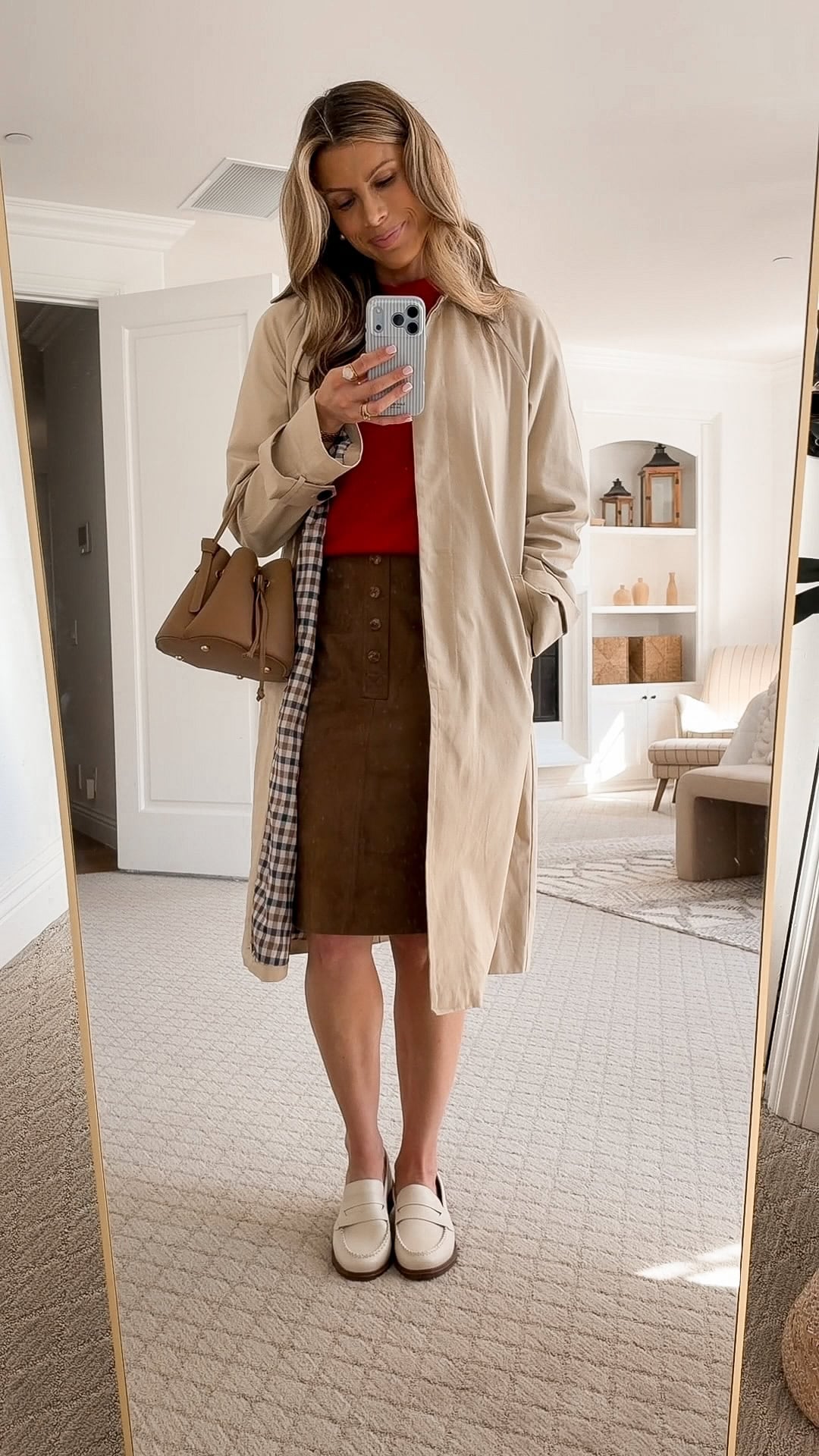 Corrine wearing the Avec Les Filles long trench coat from Anthropologie